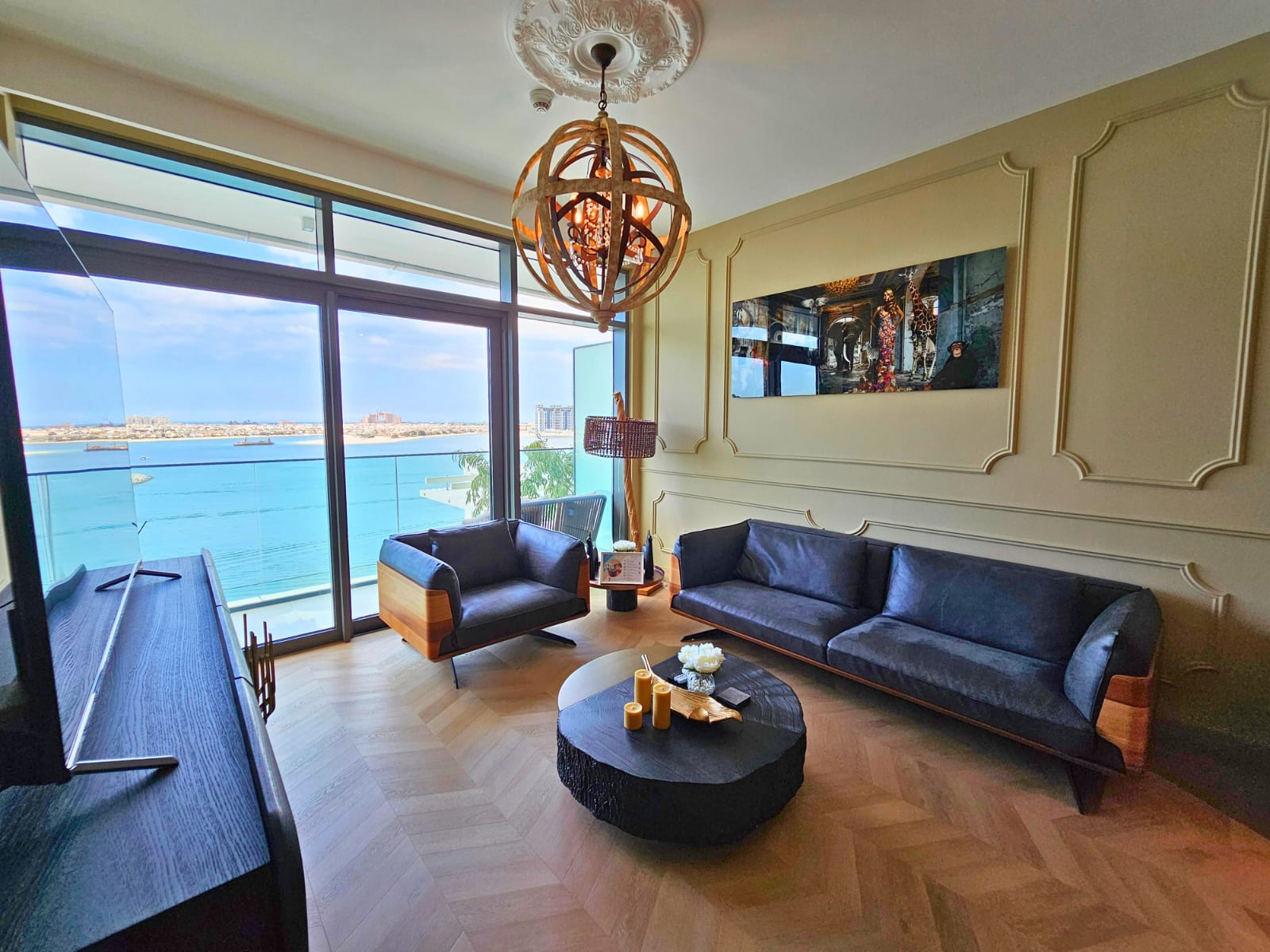 Inside of a cozy living room with a view on the sea.